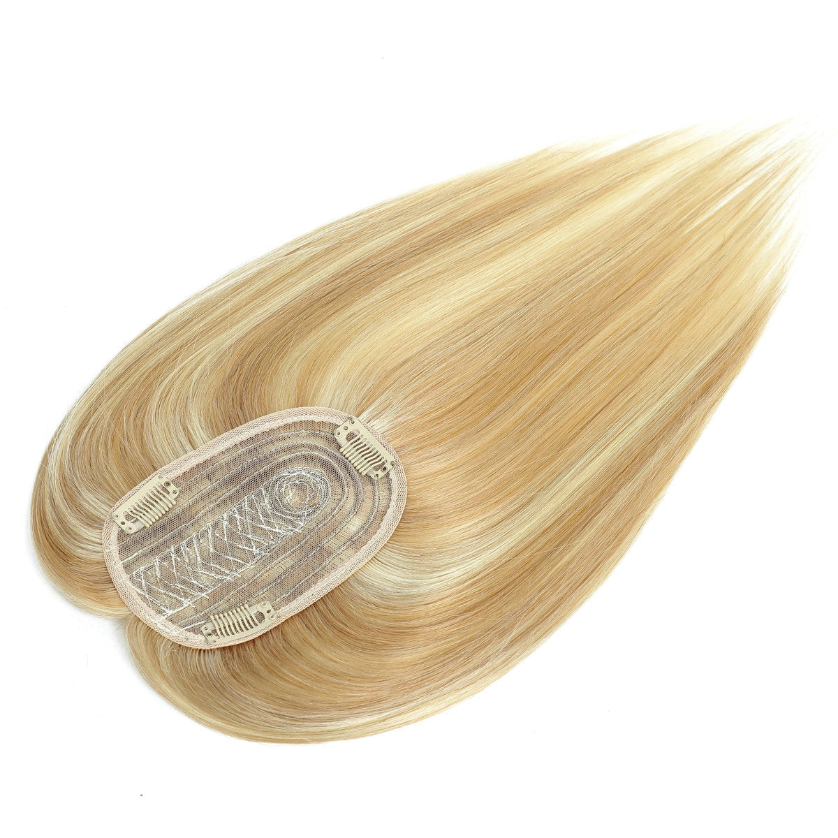 Underside of light-blonde hair topper showing oval base and three clips