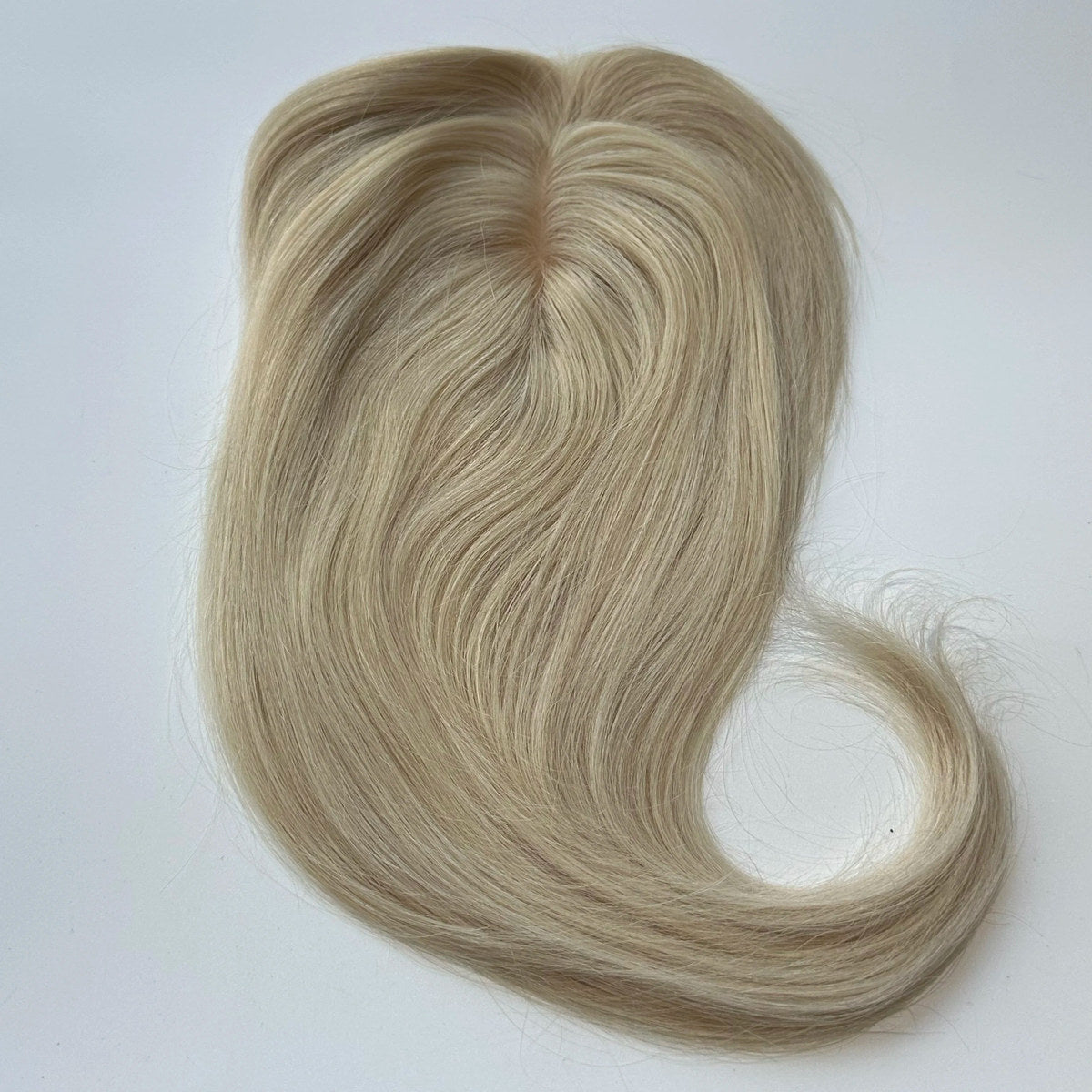 Straight human hair topper in colour 1001, product top view