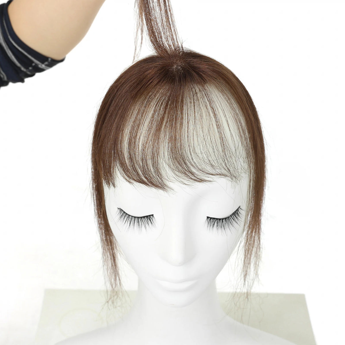 Warm chestnut brown fringe front view on a mannequin