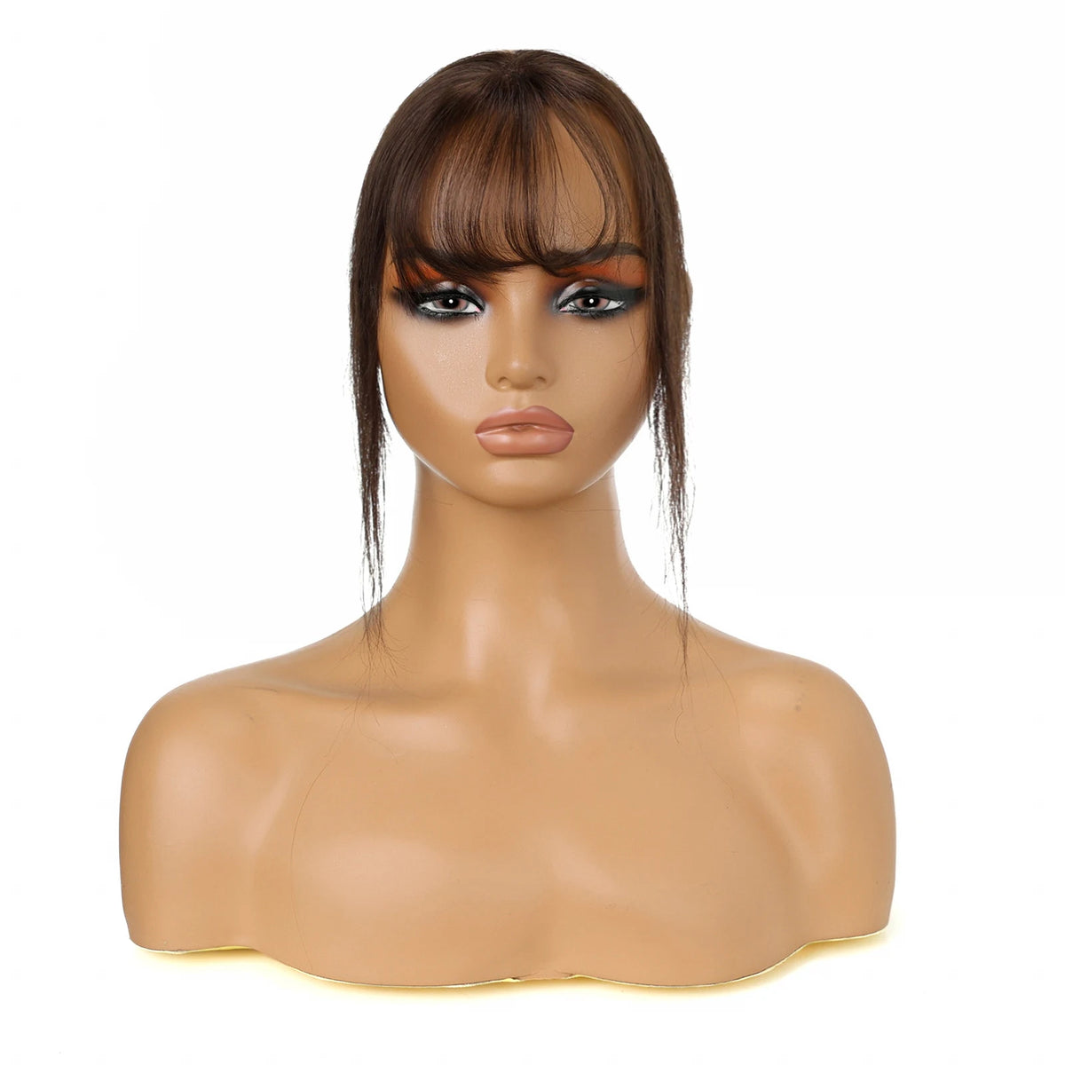 Warm chestnut brown fringe and side strands displayed on a mannequin