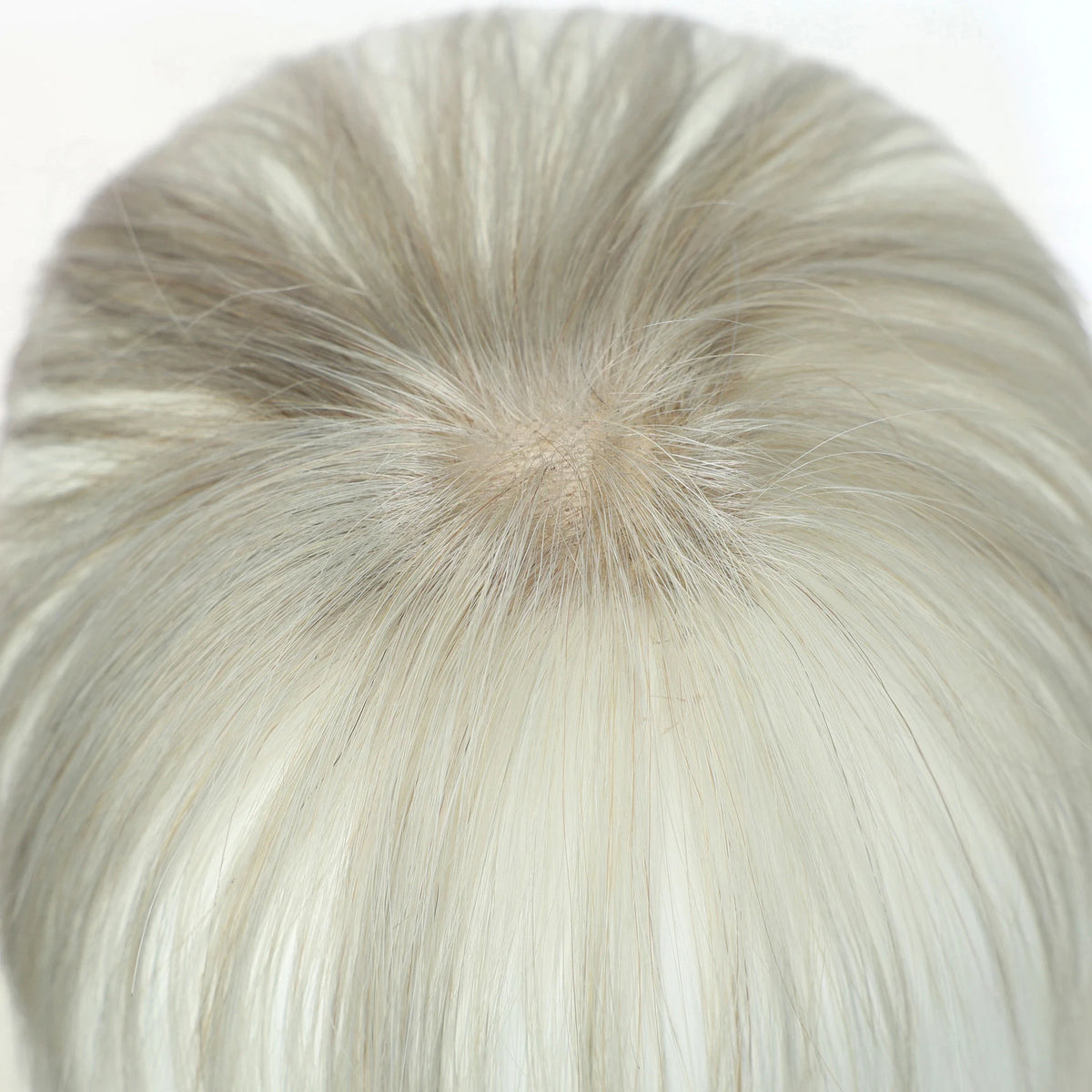 Light silver grey fringe hairpiece top view showing hair parting