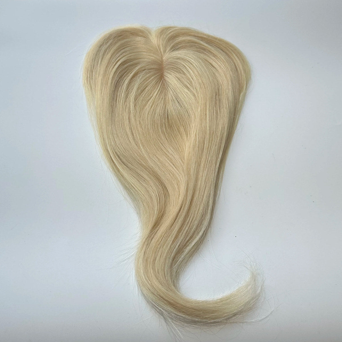 Straight human hair topper in colour 613, product top view