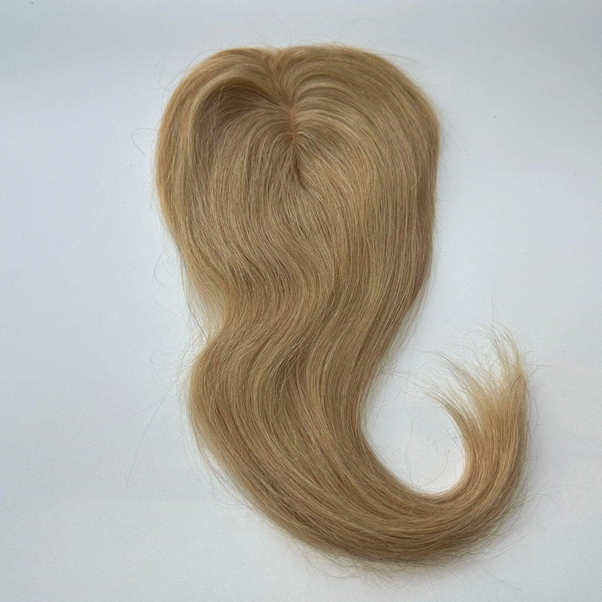 Straight human hair topper in colour 27, product top view