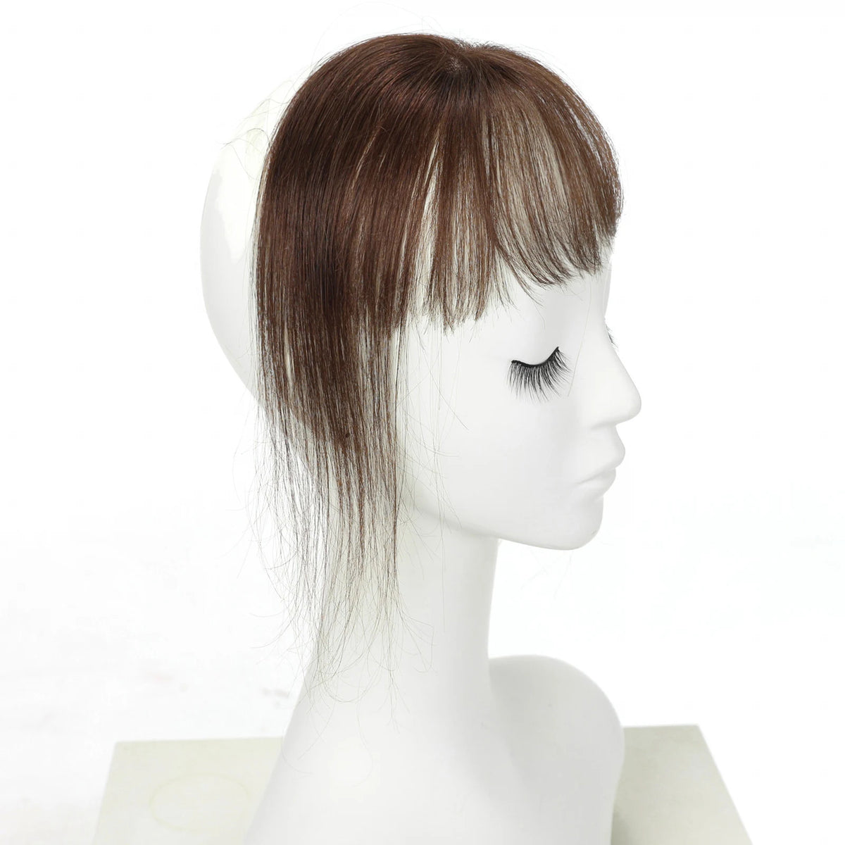 Warm chestnut brown fringe side view on a mannequin