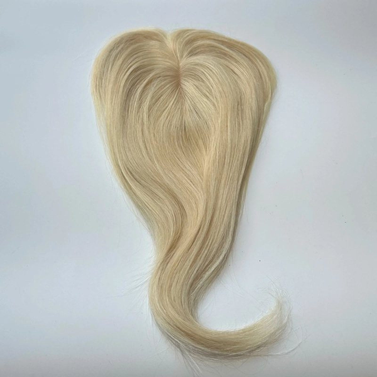 Colour 613 straight human hair topper top-side view; light base and clips, 12 x 14 cm, 18 inch